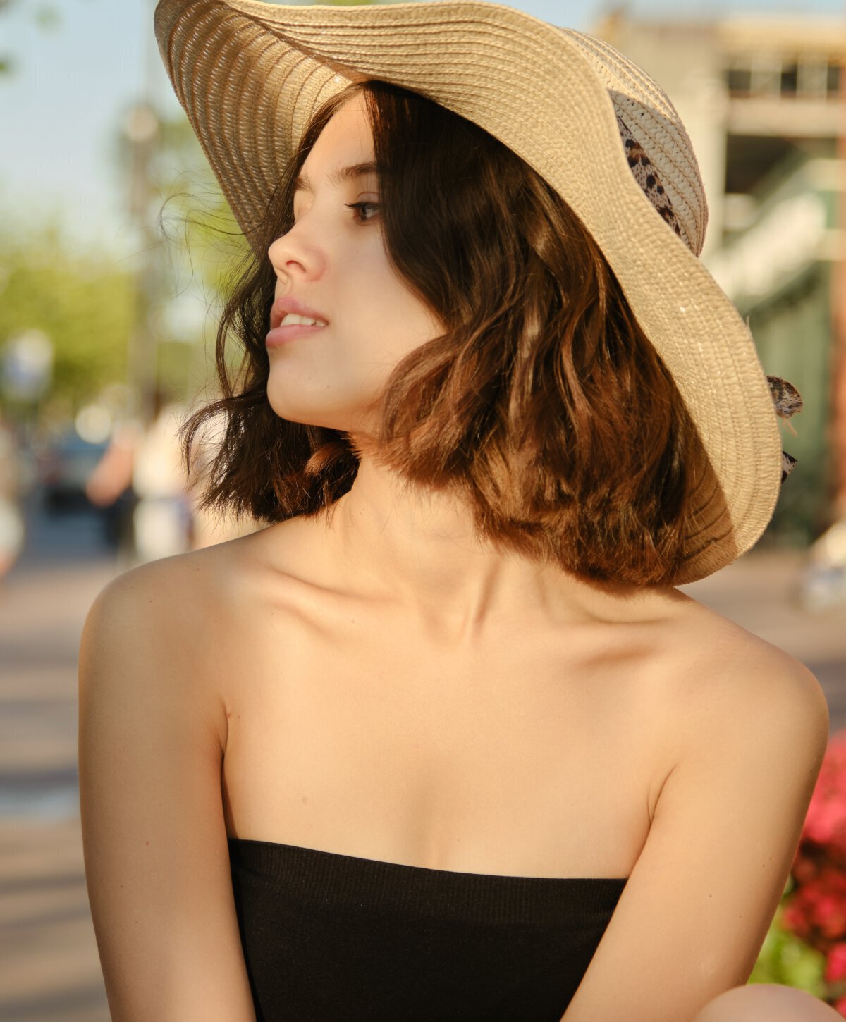 Vienna Medspa model with tan hat
